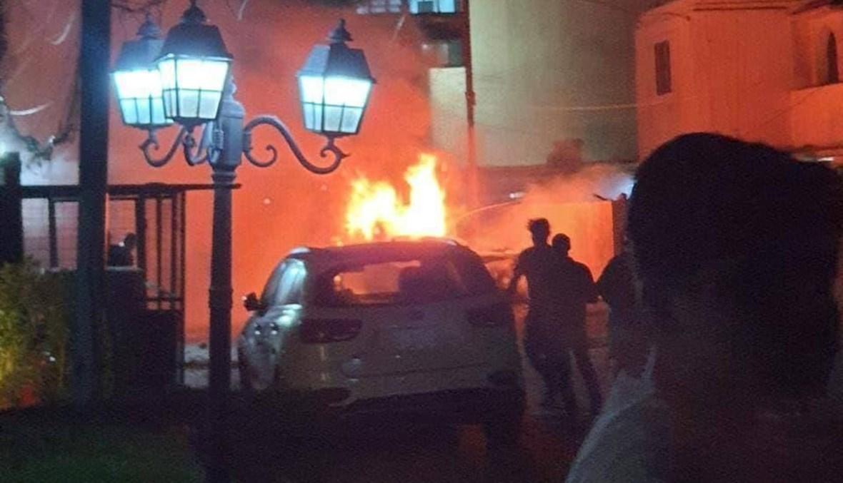 انفجاران في بغداد الاول استهدف سيارةً امنيةً والثاني محلاً لبيع المشروبات الروحية"فيديو"