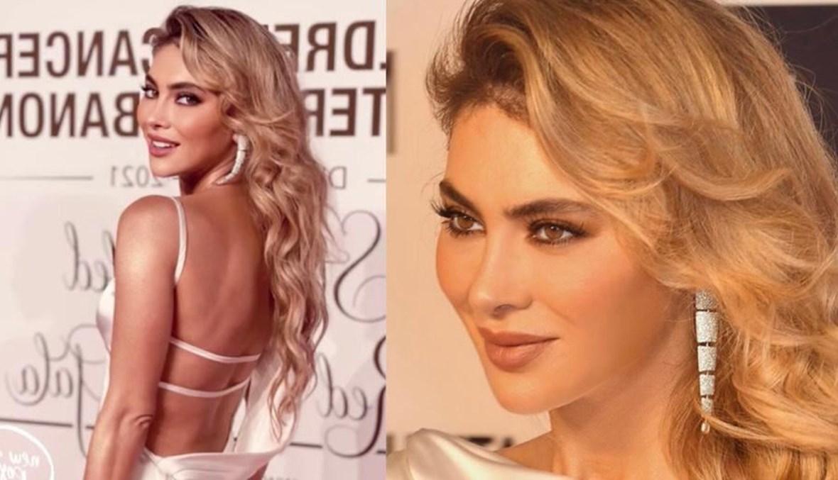 ستيفاني صليبا بتوقيع هاس إدريس في الحفل الخيري لمركز سرطان الأطفال في دبي