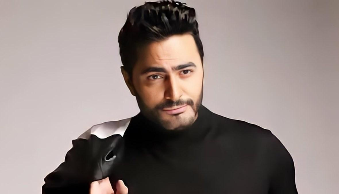 تامر حسني المستاء من الهجوم على فيلم "بحبك": لن ألتفت لمأجورين