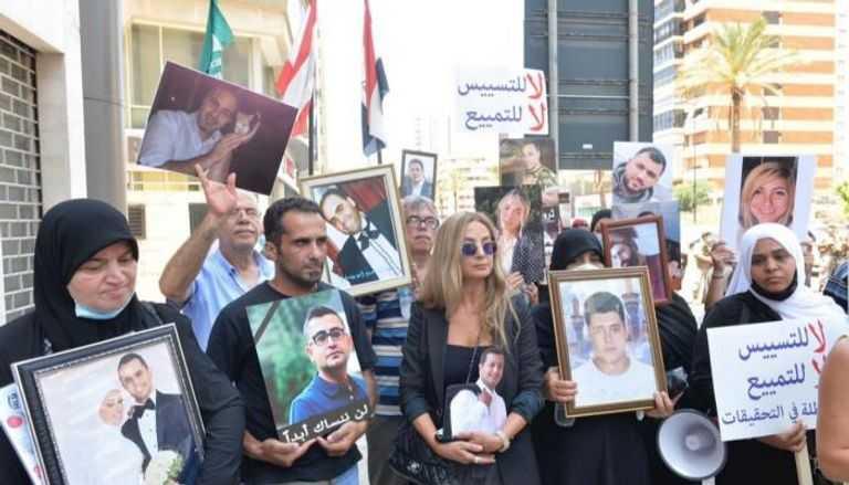 أهالي ضحايا المرفأ ينتظرون على ارتدادات الزلزال القضائي..طبخة "التسوية" قد تطيح بالبيطار