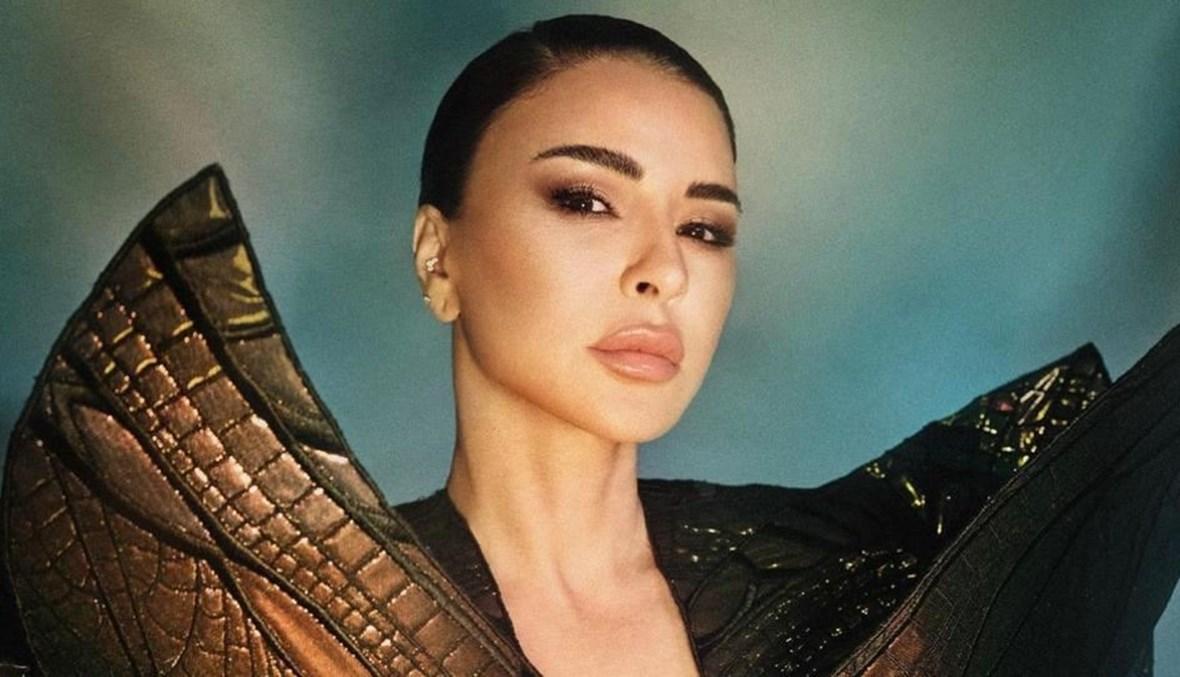 ماغي بو غصن بجلد تمساح من طوني ورد