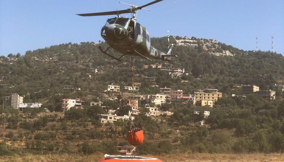 طوافة عسكرية بدأت طلعاتها لإهماد النيران المندلعة منذ مساء أمس في أحراج وادي حقل الخربة