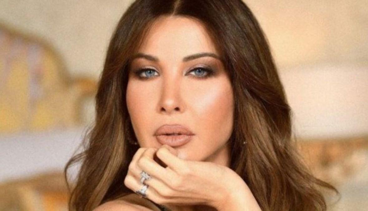 نانسي عجرم تروج لأغنيتها الجديدة "من نظرة"