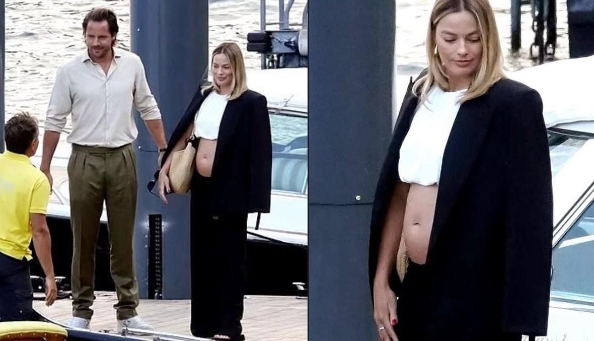 مارغو روبي حامل والباباراتزي يلتقطون صوراً لبطنها المكشوف