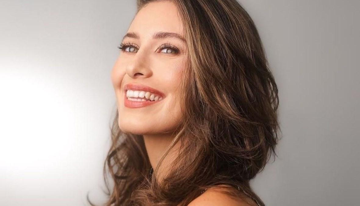 ملكة جمال لبنان ندى كوسا بالأحمر في أول جلسة تصوير بعد انتخابها (صور)