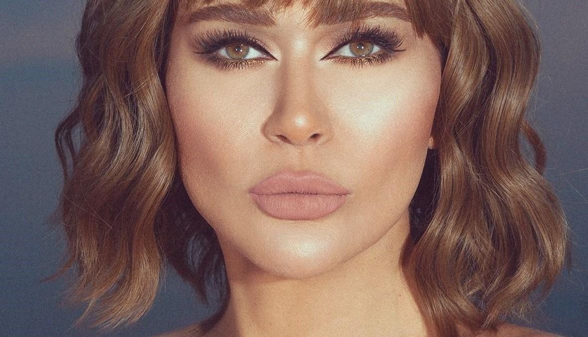 نادين الراسي بتصميم رومانسي الطابع (صور)