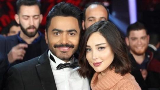 فارق العمر بين تامر حسني وزوجته يثير الجدل ويفاجئ الجميع...